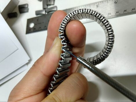 Titanium flex band adjustment